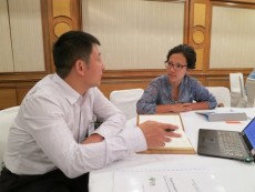 Two matchmaking participants at the Impact and Policy Conference in Bangkok.