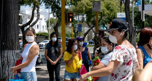 Shutterstock photo of people wearing face masks during the COVID-19 pandemic.