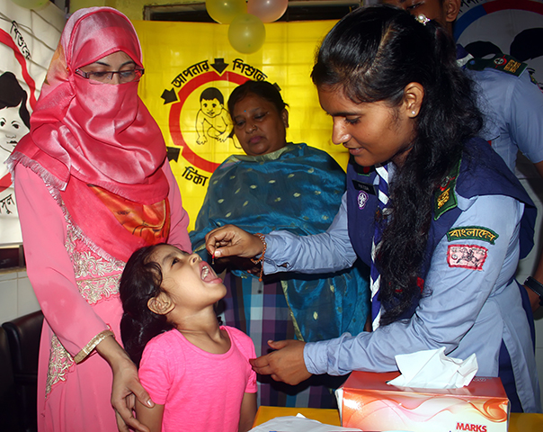Children in Sylhet, Bangladesh receive vitamin A capsules at a temporary vaccination center. © 2018 HM Shahidul Islam / Shutterstock
