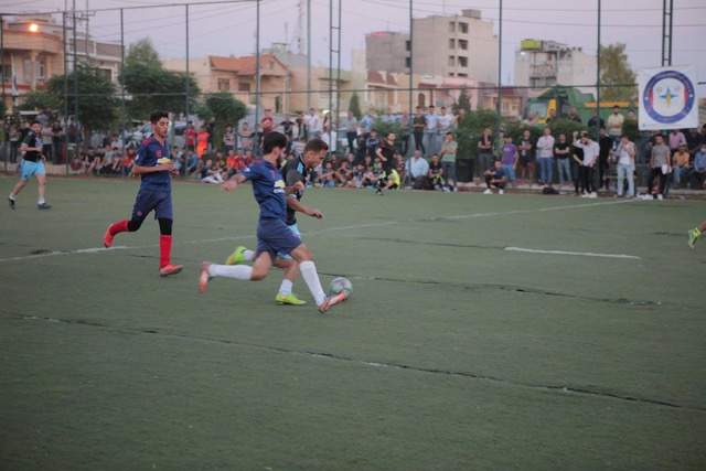 The inter-religious soccer league match in Iraq.