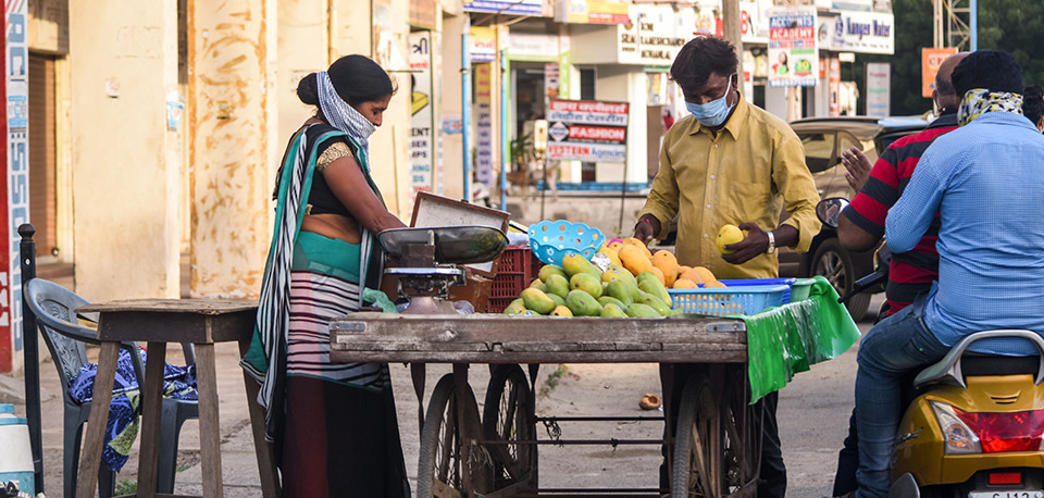 People wearing face masks in India. Via Prayag Tejwani on Unsplash.