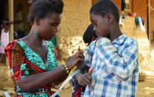 There is a shortage of healthcare workers in sub-Saharan Africa A Zambian health worker administers medicine