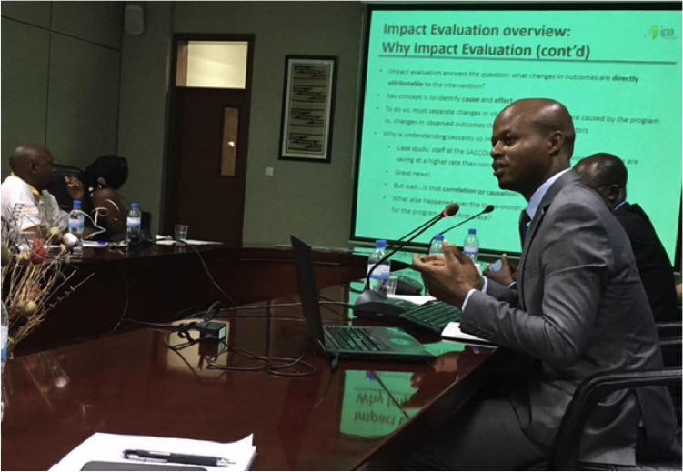 Emmanuel Hakizimfura, Senior Research Associate for the Financial Education evaluation in Rwanda, presenting during the workshop. Emmanuel Hakizimfura, Senior Research Associate for the Financial Education evaluation in Rwanda, presenting during the workshop.