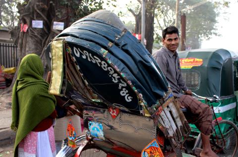 A rickshaw driver in Dhaka Bangladesh