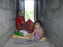 nepal finance woman and child.jpg