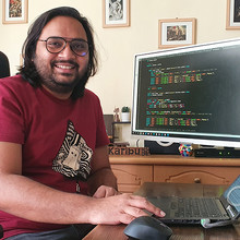 Mehrab-Ali-Cropped-Square.jpg Mehrab Ali working at home during the COVID-19 pandemic.